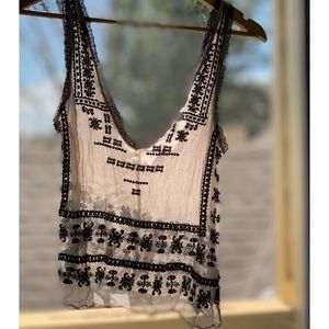 delicate feminine cream & black sheer tank